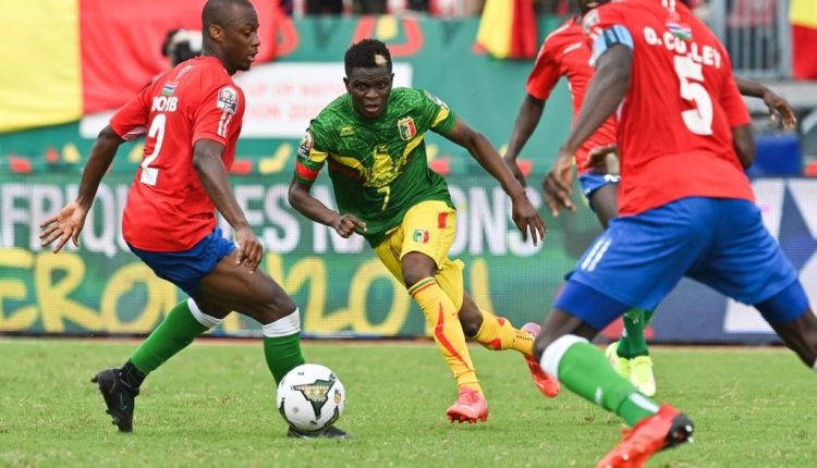 Mali and Gambia share point with late penalties